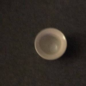 Pink and cream earthenware pot. 2 inches tall